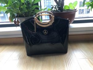 MCD Bright Lacquered Platinum Leather Bag photo review